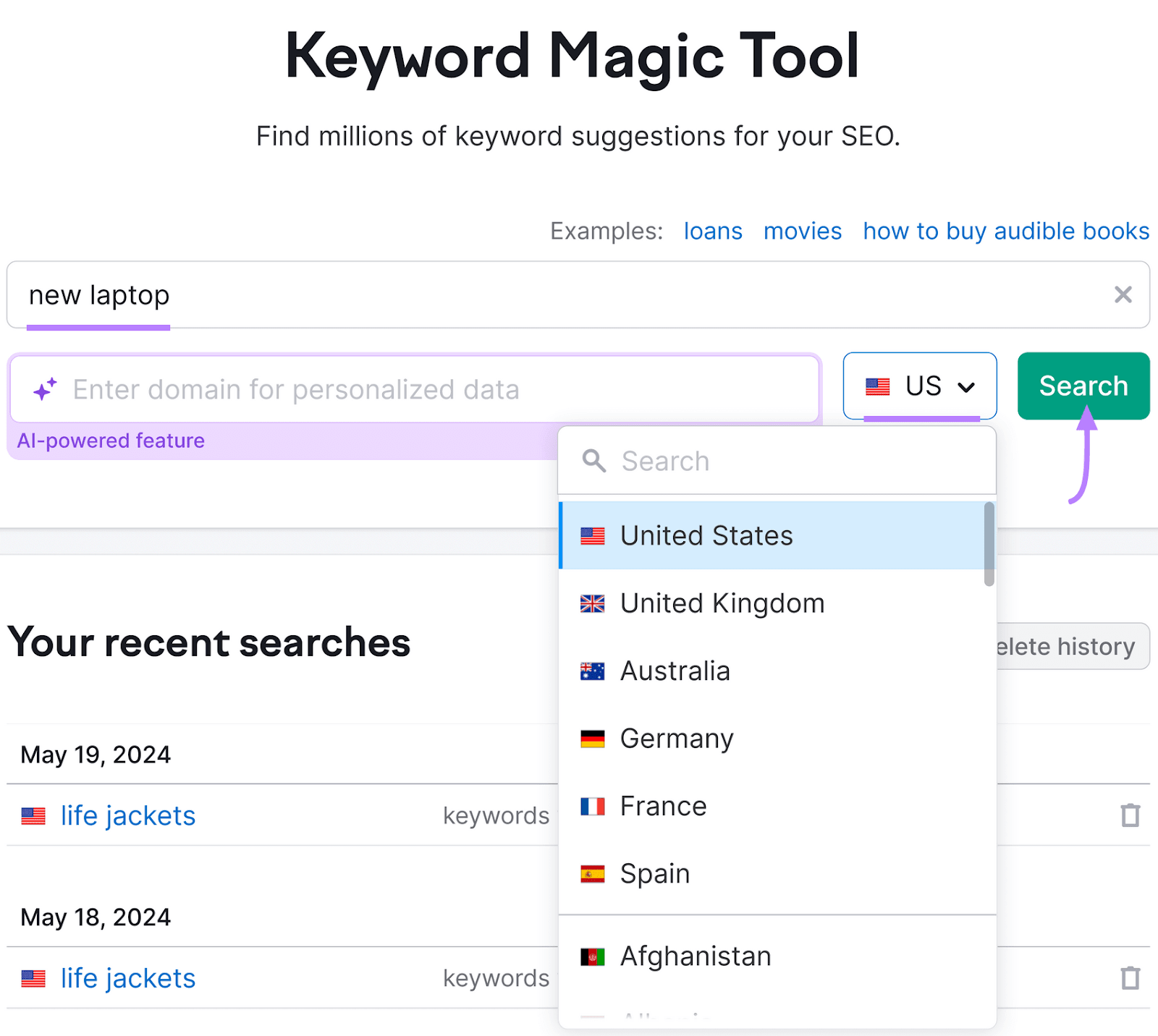 Keyword Magic Tool with a search bar where "new laptop" is typed, country selection drop-down, and a green "Search" button.